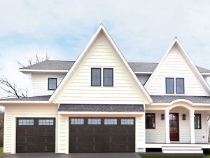 Image of white home with beautiful wood garage door