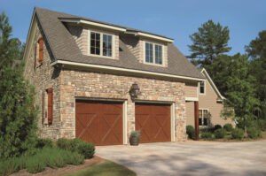 Picture of a home with beautiful new garage doors.